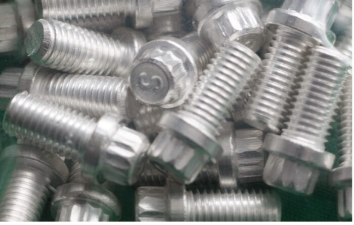 Figure 18. Low friction silver plated bolts with 12-point heads.