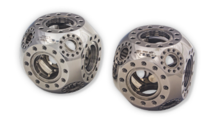 Figure 5. Spherical Cube Multi-CFTM  Stainless Steel 316L (left) and Titanium Alloy (right) Spherical Cube UHV Vacuum Chambers with six (6) 2.75” (C) ports and eight (8) 1.33”(A) additional ports.